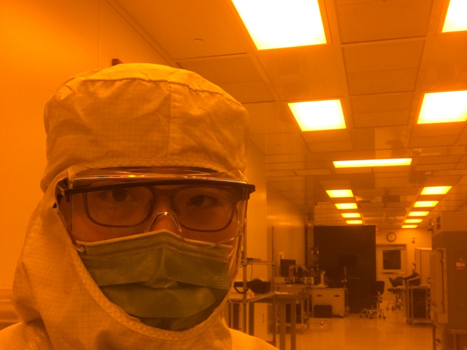 Yun Goo Lee working in a cleanroom fabrication environment